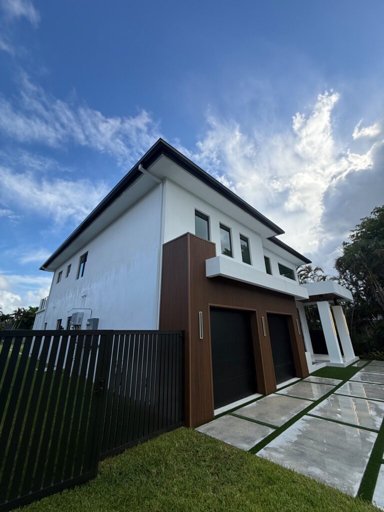 Downspout installation carrying water away from the foundation, Fort Lauderdale, Florida