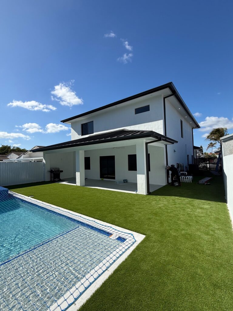 Seamless gutter installation on a home in Opa-locka, Florida