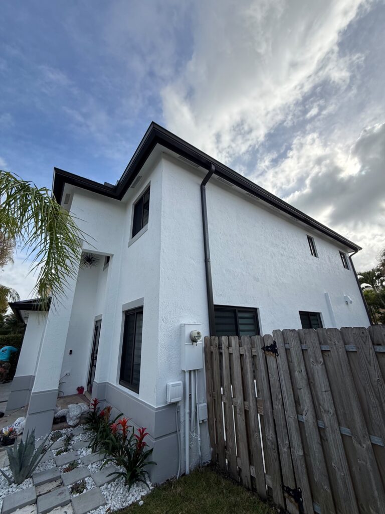 Seamless gutter installation on a home in Opa-locka, Florida