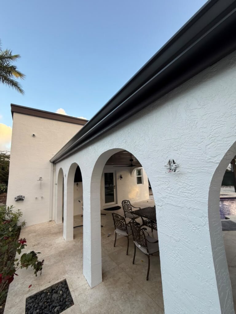 Seamless gutter installation on a home in Opa-locka, Florida