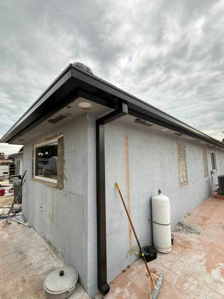 Seamless gutter installation on a home in Opa-locka, Florida