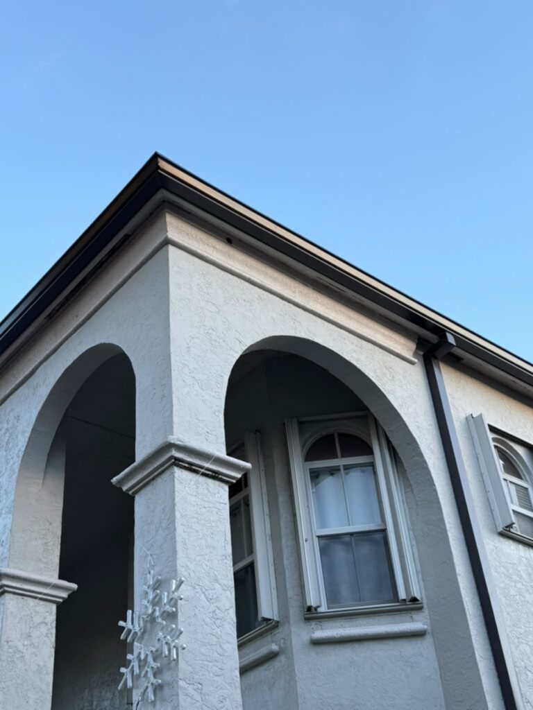 Downspout installation carrying water away from the foundation, Fort Lauderdale, Florida