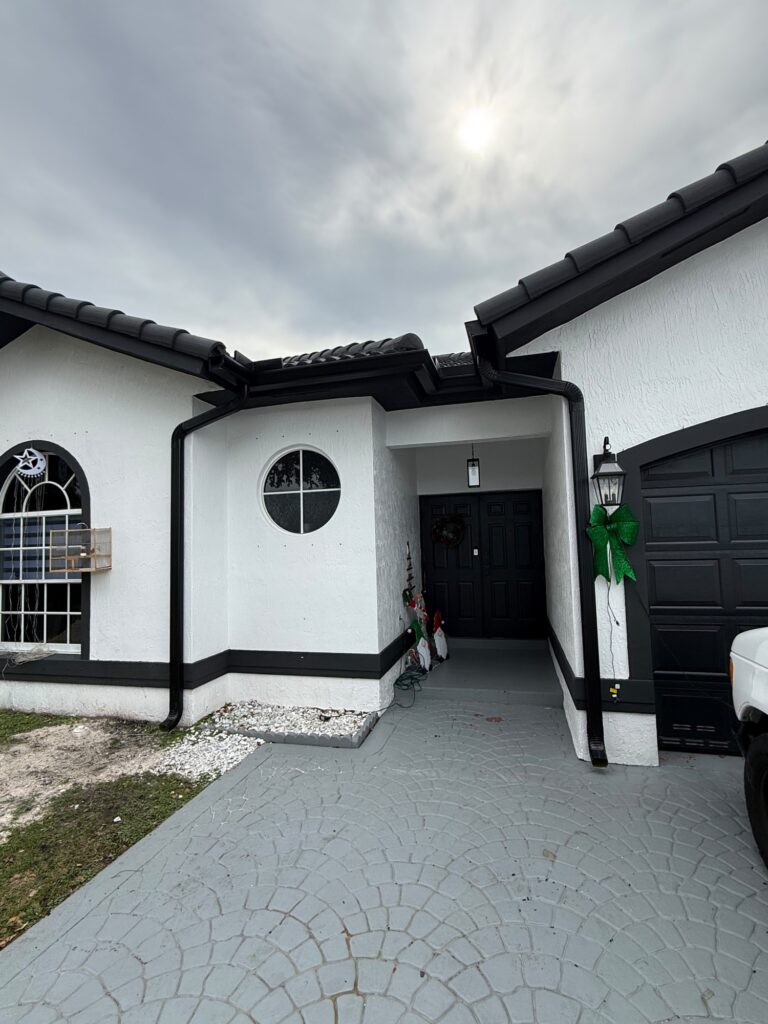 Seamless gutter installation on a home in Opa-locka, Florida