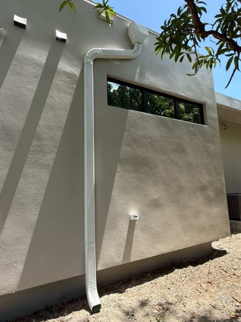 Seamless gutter installation on a home in Opa-locka, Florida
