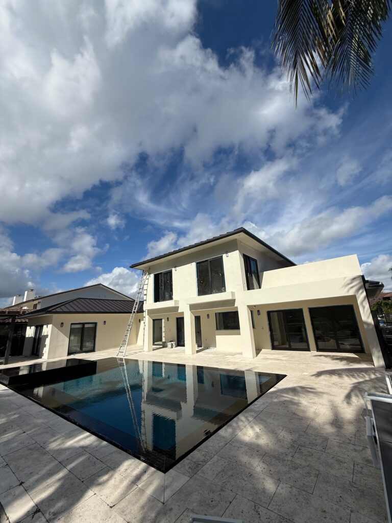 Downspout installation carrying water away from the foundation, Fort Lauderdale, Florida