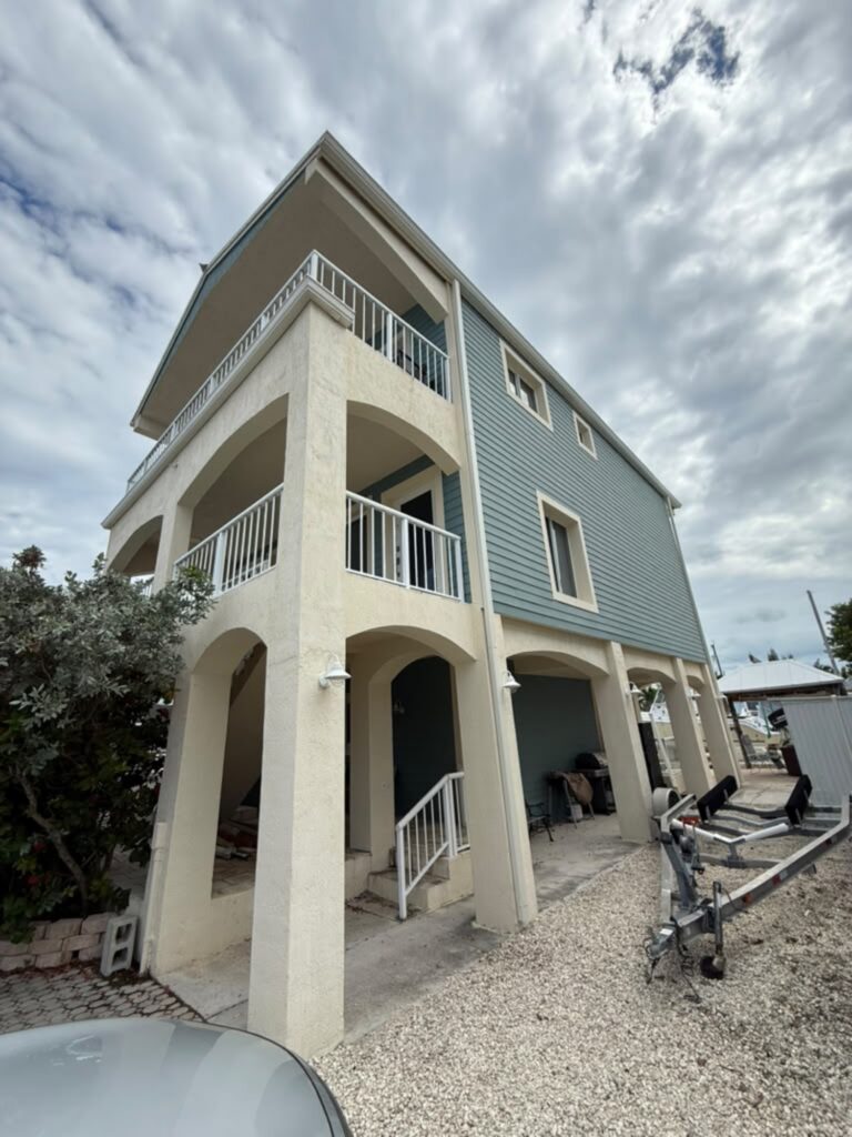 Seamless gutter installation on a home in Opa-locka, Florida