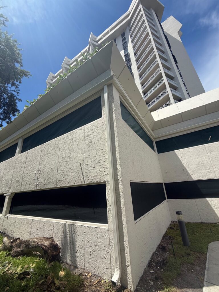 Downspout installation carrying water away from the foundation, Fort Lauderdale, Florida